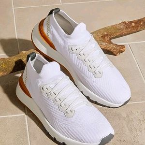 White Brunello Cucinelli shoes.